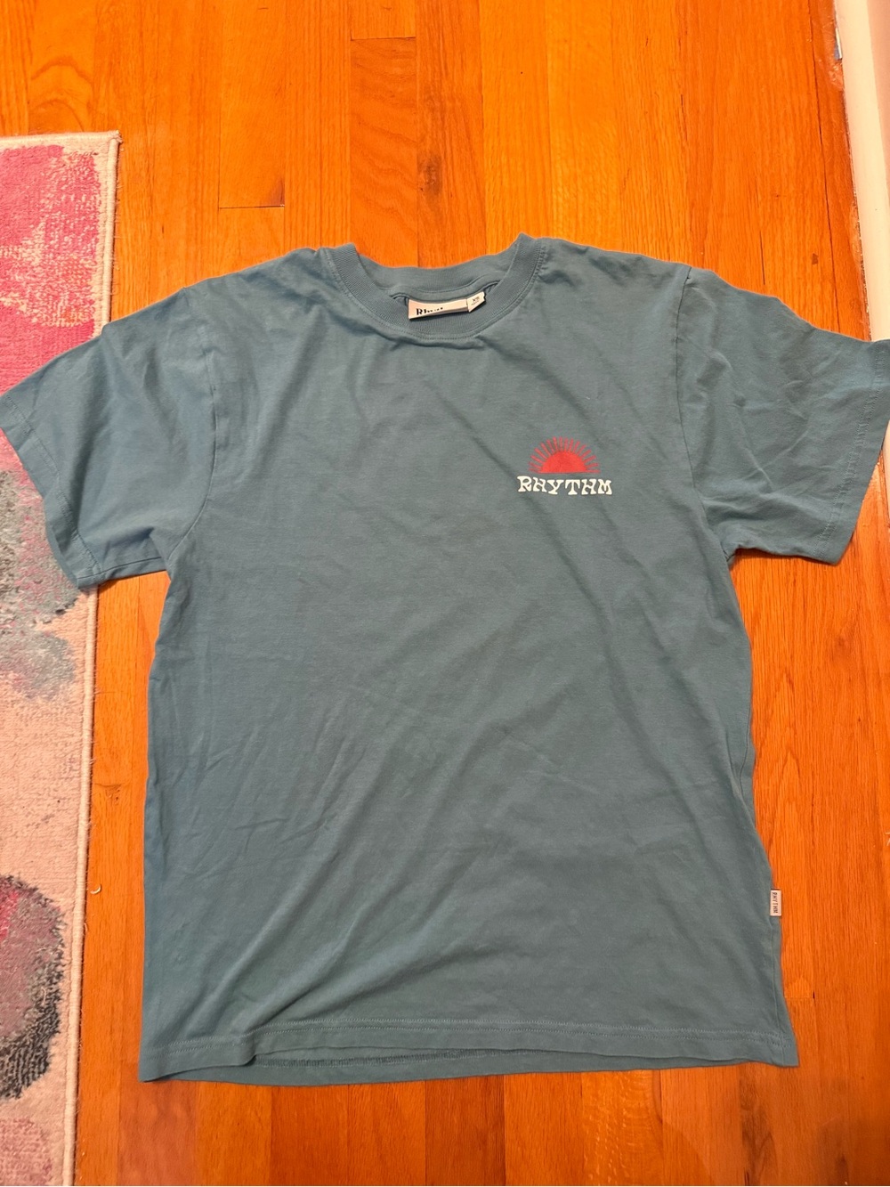 Rhythm. Men's Teal Short Sleeve Tee with Red Graphic